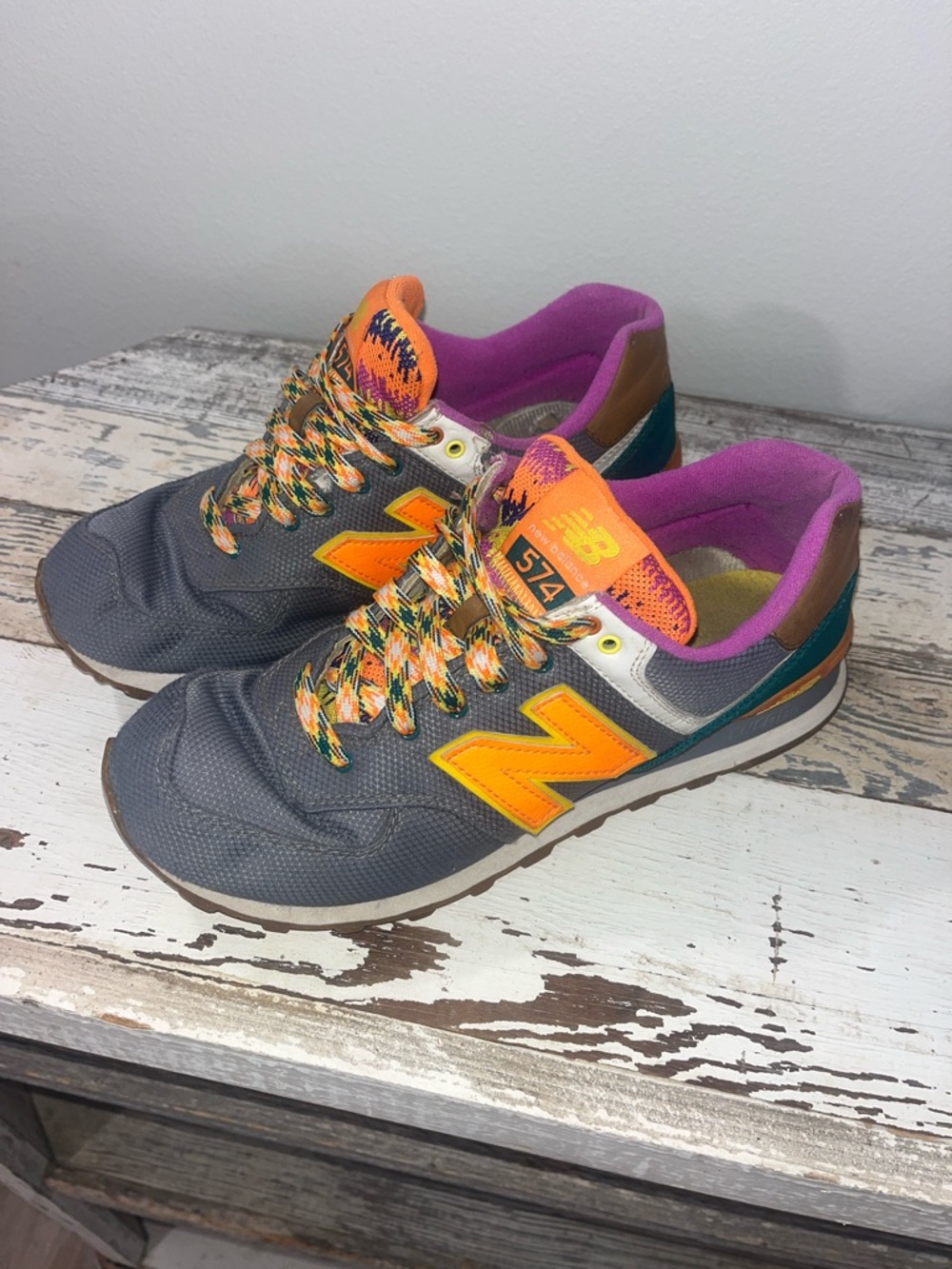 New Balance Women’s 574 Gray and Orange Casual Sneakers